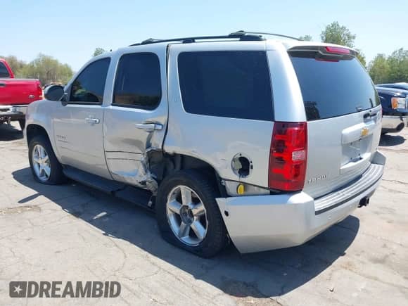 2012 Chevrolet Tahoe LT with VIN 1GNSCBE06CR255554, listed as a IAAI auction lot 42544690 with 136,070 mi miles and . Bid and sale history available at DreamBid. Image 3.