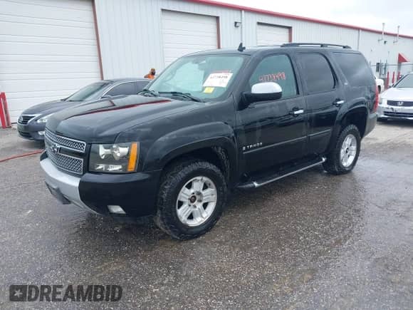 2007 Chevrolet Tahoe LTZ z VIN 1GNFK13057R430190, wystawiony jako IAAI lot #42738498 z przebiegiem 276 224 mil mil oraz . Historia ofert i sprzedaży dostępna na DreamBid. Obrazek 2.