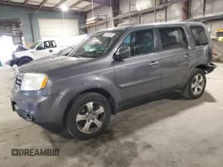 2014 Honda Pilot EX-L with VIN 5FNYF4H57EB008792, listed as a Copart auction lot 80823265 with 208,875 mi miles and Salvage title. Bid and sale history available at DreamBid. Image 1.