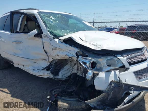 2009 Chevrolet Traverse LTZ с VIN 1GNER33D39S103465, выставлен на аукционе IAAI как лот 42232210 с пробегом 98 260 миль миль и . История ставок и продаж доступна на DreamBid. Изображение 6.