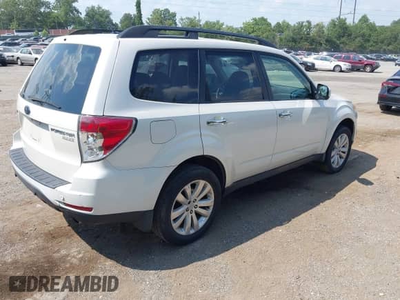 2012 Subaru Forester X Limited z VIN JF2SHAFC5CH440196, wystawiony jako IAAI lot #42883120 z przebiegiem 174 671 mil mil oraz . Historia ofert i sprzedaży dostępna na DreamBid. Obrazek 4.