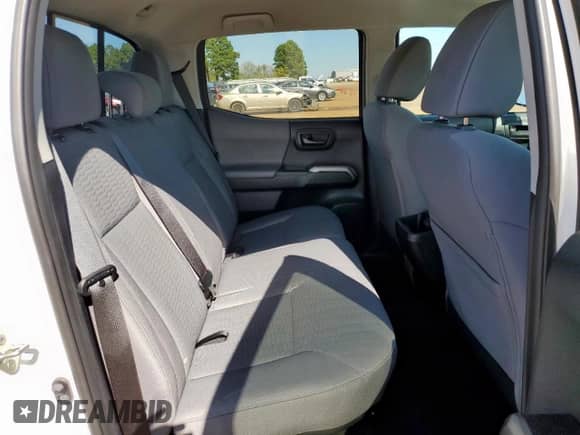 2019 Toyota Tacoma SR5 with VIN 5TFAZ5CN1KX085228, listed as a Copart auction lot 82779455 with 91,822 mi miles and Salvage title. Bid and sale history available at DreamBid. Image 10.