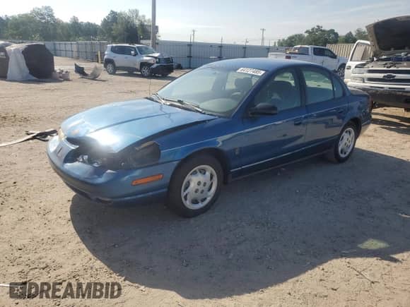 2002 Saturn SL с VIN 1G8ZK52732Z185890, выставлен на аукционе Copart как лот 64127485 с пробегом 176 286 миль миль и Списание • Salvage title. История ставок и продаж доступна на DreamBid. Изображение 1.