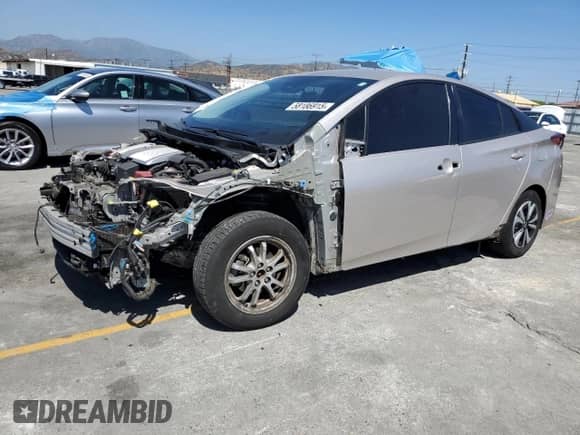 2018 Toyota Prius Plus z VIN JTDKARFP7J3099284, wystawiony jako Copart lot #58186915 z przebiegiem 51 694 mil mil oraz Szkoda całkowita • Salvage title. Historia ofert i sprzedaży dostępna na DreamBid. Obrazek 1.