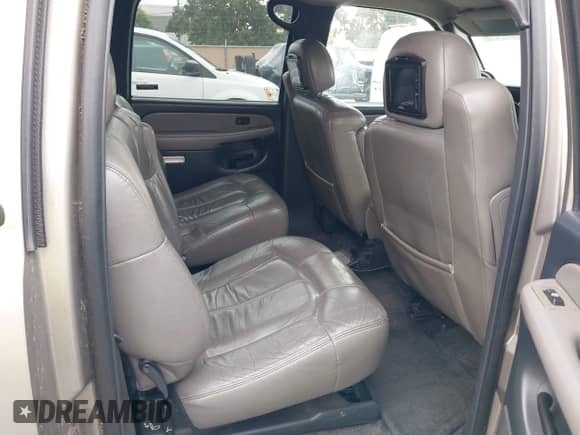 2002 Chevrolet Suburban LT z VIN 1GNFK16T42J208091, wystawiony jako IAAI lot #42737106 z przebiegiem 191 181 mil mil oraz . Historia ofert i sprzedaży dostępna na DreamBid. Obrazek 8.