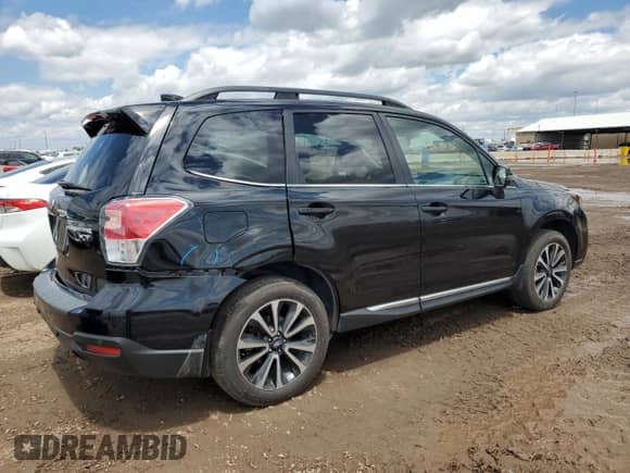 2017 Subaru Forester Touring z VIN JF2SJGWC2HH432961, wystawiony jako Copart lot #59044165 z przebiegiem 58 716 mil mil oraz Szkoda całkowita • Salvage title. Historia ofert i sprzedaży dostępna na DreamBid. Obrazek 3.