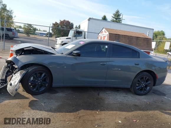2023 Dodge Charger SXT with VIN 2C3CDXJG7PH704485, listed as a IAAI auction lot 43229216 with 18,544 mi miles and . Bid and sale history available at DreamBid. Image 13.