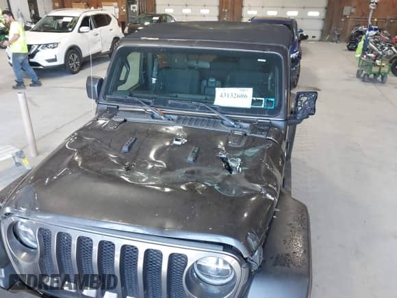 2020 Jeep Wrangler Sport S with VIN 1C4GJXAN6LW157127, listed as a IAAI auction lot 43132606 with 14,778 mi miles and . Bid and sale history available at DreamBid. Image 6.