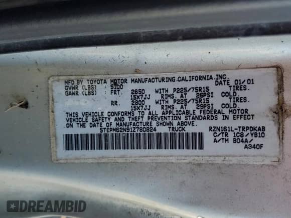 2001 Toyota Tacoma with VIN 5TEPM62N91Z780824, listed as a Copart auction lot 90220975 with 211,375 mi miles and Clean title. Bid and sale history available at DreamBid. Image 12.