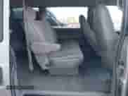 2004 Chevrolet Astro z VIN 1GNEL19X74B125338, wystawiony jako IAAI lot #42410655 z przebiegiem 169 085 mil mil oraz . Historia ofert i sprzedaży dostępna na DreamBid. Obrazek 8.