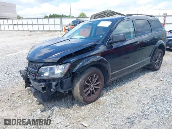 2018 Dodge Journey SE with VIN 3C4PDCAB0JT157987, listed as a IAAI auction lot 42995989 with 128,143 mi miles and . Bid and sale history available at DreamBid. Image 6.