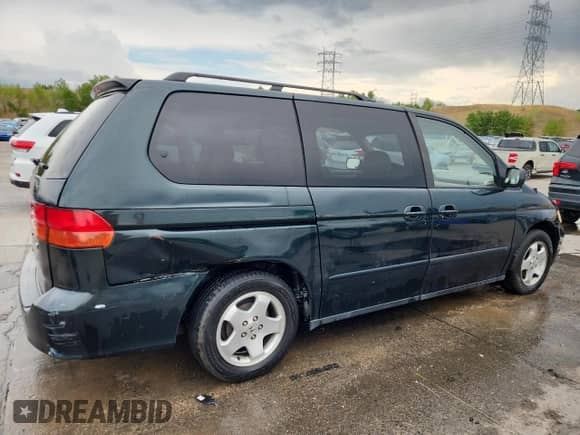 2000 Honda Odyssey EX с VIN 2HKRL1865YH558695, выставлен на аукционе Copart как лот 70275535 с пробегом 275 033 миль миль и Списание • Salvage title. История ставок и продаж доступна на DreamBid. Изображение 3.
