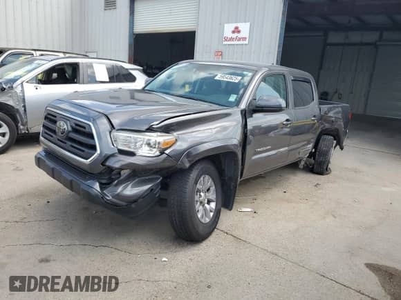 2019 Toyota Tacoma TRD Sport with VIN 5TFAZ5CN4KX078788, listed as a Copart auction lot 59543625 with 66,302 mi miles and Salvage title. Bid and sale history available at DreamBid. Image 1.
