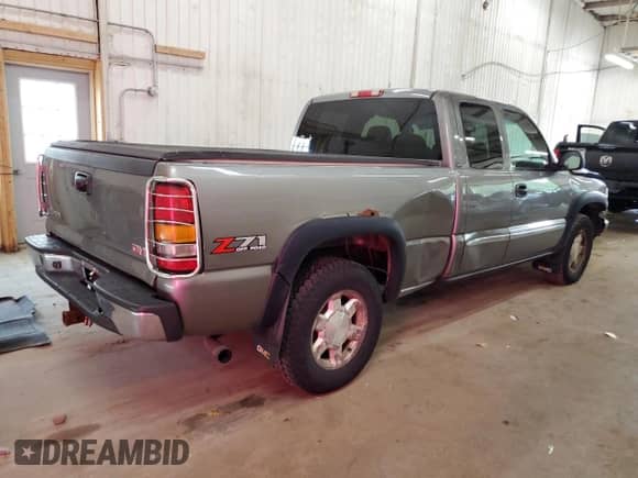 2007 GMC Sierra 1500 SLT z VIN 1GTEK19Z67Z122147, wystawiony jako Copart lot #67742935 z przebiegiem 166 251 mil mil oraz Szkoda całkowita • Salvage title. Historia ofert i sprzedaży dostępna na DreamBid. Obrazek 3.