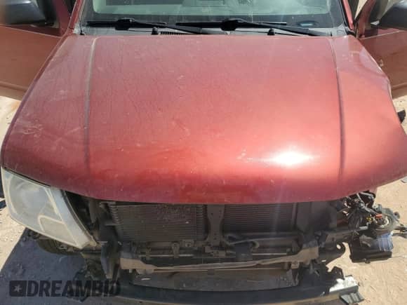 2015 Nissan Frontier S z VIN 1N6BD0CT4FN711082, wystawiony jako Copart lot #57306475 z przebiegiem Nie podano mil oraz Szkoda całkowita • Salvage title. Historia ofert i sprzedaży dostępna na DreamBid. Obrazek 11.