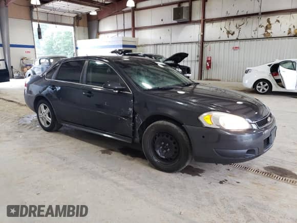 2013 Chevrolet Impala Police с VIN 2G1WD5E31D1254687, выставлен на аукционе Copart как лот 67153924 с пробегом 168 774 миль миль и Чистый • Clean title. История ставок и продаж доступна на DreamBid. Изображение 4.