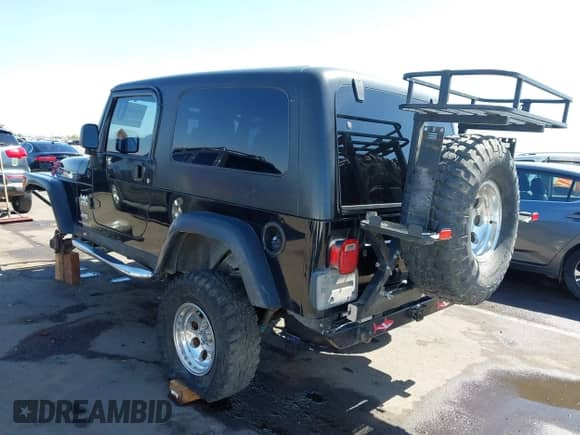 2006 Jeep Wrangler with VIN 1J4FA64S16P757277, listed as a IAAI auction lot 42169730 with 110,737 mi miles and . Bid and sale history available at DreamBid. Image 3.