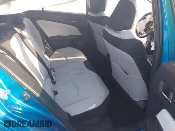 2021 Toyota Prius L Eco with VIN JTDKAMFU1M3136133, listed as a IAAI auction lot 43285926 with 49,911 mi miles and . Bid and sale history available at DreamBid. Image 8.