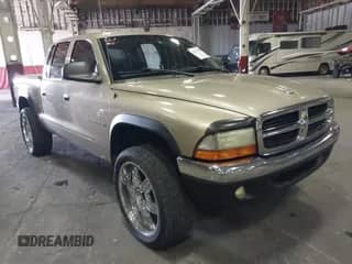 2002 Dodge Dakota SLT with VIN 1B7HG48N32S592152, listed as a IAAI auction lot 42474593 with Not provided miles and . Bid and sale history available at DreamBid. Image 1.