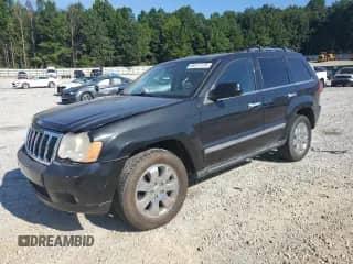 2010 Jeep Grand Cherokee Limited z VIN 1J4RR5GT8AC104045, wystawiony jako Copart lot #65511775 z przebiegiem 230 582 mil mil oraz Czysty tytuł • Clean title. Historia ofert i sprzedaży dostępna na DreamBid. Obrazek 1.