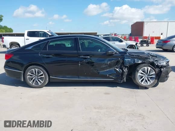 2020 Honda Accord Touring with VIN 1HGCV3F96LA004608, listed as a IAAI auction lot 42573726 with 57,033 mi miles and . Bid and sale history available at DreamBid. Image 12.