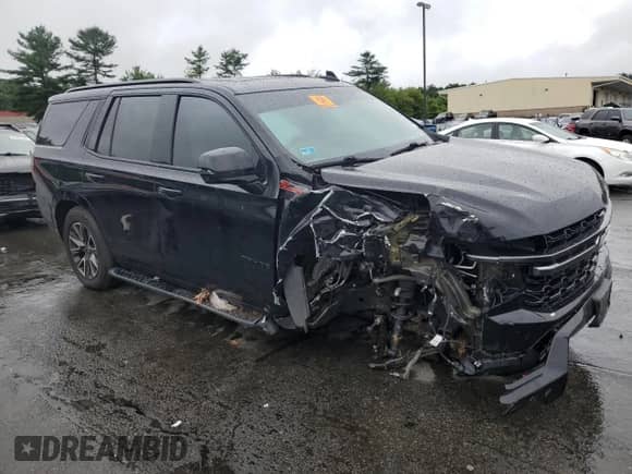 2022 Chevrolet Tahoe Z71 with VIN 1GNSKPKD5NR173308, listed as a Copart auction lot 63232605 with 54,025 mi miles and Salvage title. Bid and sale history available at DreamBid. Image 4.