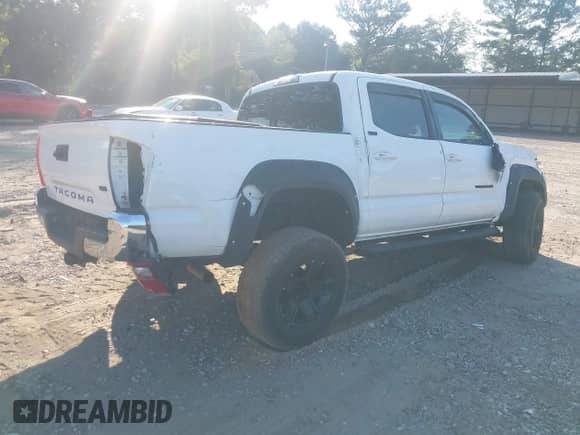 2021 Toyota Tacoma SR5 with VIN 3TMAZ5CN8MM152710, listed as a IAAI auction lot 43148239 with 40,000 mi miles and . Bid and sale history available at DreamBid. Image 4.