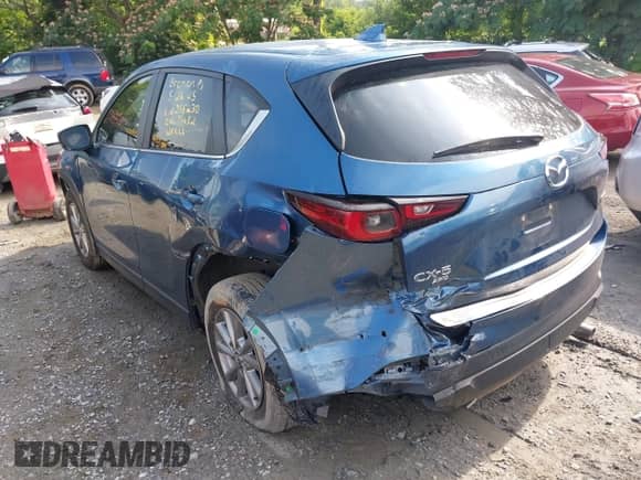 2023 Mazda CX-5 S Preferred z VIN JM3KFBCM3P0255230, wystawiony jako IAAI lot #42420823 z przebiegiem 69 331 mil mil oraz . Historia ofert i sprzedaży dostępna na DreamBid. Obrazek 3.