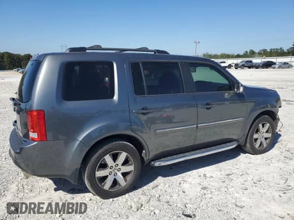 2012 Honda Pilot Touring with VIN 5FNYF3H97CB016448, listed as a Copart auction lot 82044975 with 154,055 mi miles and Salvage title. Bid and sale history available at DreamBid. Image 3.