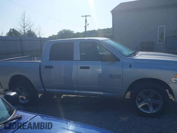 2015 Ram 1500 Express with VIN 1C6RR7KG4FS672275, listed as a IAAI auction lot 42452907 with 161,265 mi miles and . Bid and sale history available at DreamBid. Image 13.