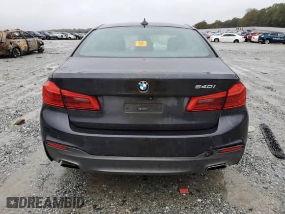 2019 BMW 5 Series 540i with VIN WBAJE5C50KWW20628, listed as a Copart auction lot 90334115 with Not provided miles and Clean title. Bid and sale history available at DreamBid. Image 6.