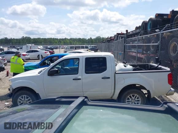2018 Nissan Frontier SV z VIN 1N6AD0EV1JN717375, wystawiony jako IAAI lot #42491578 z przebiegiem 88 000 mil mil oraz . Historia ofert i sprzedaży dostępna na DreamBid. Obrazek 14.