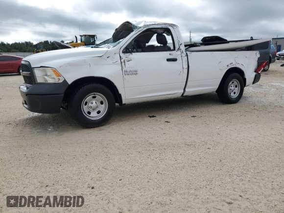 2013 Ram 1500 Tradesman with VIN 3C6JR6DG7DG577041, listed as a Copart auction lot 70975954 with Not provided miles and Salvage title. Bid and sale history available at DreamBid. Image 1.