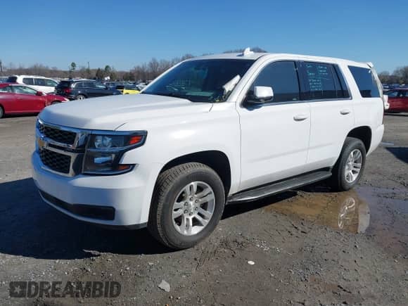 2018 Chevrolet Tahoe Commercial z VIN 1GNSKFECXJR201692, wystawiony jako IAAI lot #41606352 z przebiegiem 36 882 mil mil oraz . Historia ofert i sprzedaży dostępna na DreamBid. Obrazek 19.