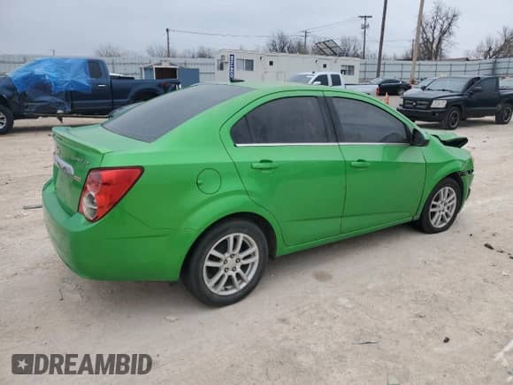 2014 Chevrolet Sonic LT с VIN 1G1JC5SBXE4216020, выставлен на аукционе Copart как лот 41303424 с пробегом 59 001 миль миль и Списание • Salvage title. История ставок и продаж доступна на DreamBid. Изображение 3.