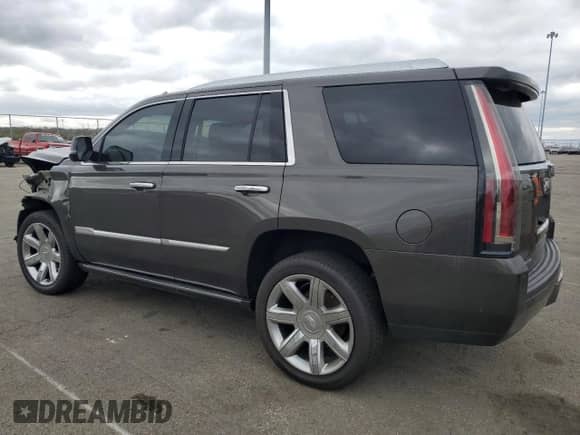 2020 Cadillac Escalade Premium Luxury with VIN 1GYS4CKJ7LR156518, listed as a Copart auction lot 53136925 with 87,706 mi miles and Salvage title. Bid and sale history available at DreamBid. Image 2.