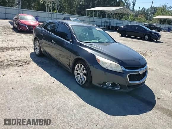 2014 Chevrolet Malibu LTZ with VIN 1G11H5SL0EF209060, listed as a Copart auction lot 86602555 with 323,622 mi miles and Salvage title. Bid and sale history available at DreamBid. Image 13.