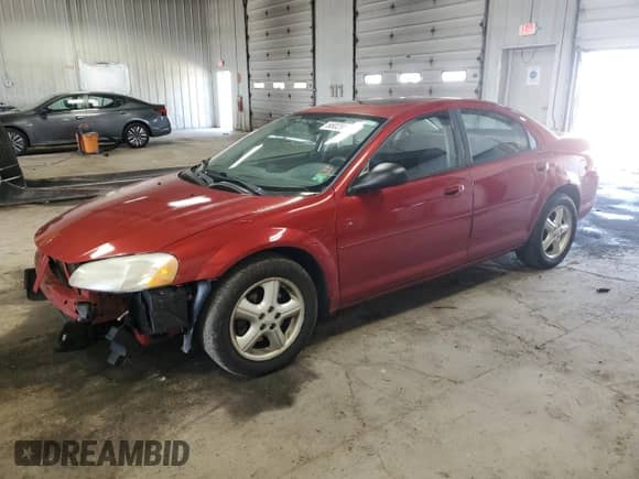 2004 Dodge Stratus SXT z VIN 1B3EL46R34N300314, wystawiony jako Copart lot #66029545 z przebiegiem 144 467 mil mil oraz Nie do naprawy • Non repairable. Historia ofert i sprzedaży dostępna na DreamBid. Obrazek 1.