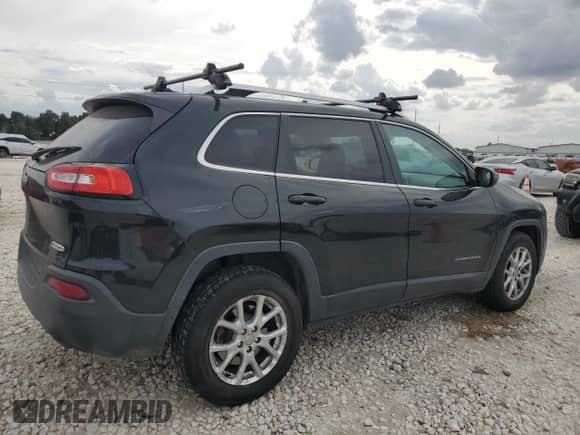 2014 Jeep Cherokee Latitude with VIN 1C4PJMCS7EW241090, listed as a Copart auction lot 82779675 with 146,040 mi miles and Clean title. Bid and sale history available at DreamBid. Image 3.