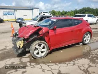 2013 Hyundai Veloster w/Gray Int z VIN KMHTC6AD8DU087858, wystawiony jako Copart lot #61438185 z przebiegiem Nie podano mil oraz Szkoda całkowita • Salvage title. Historia ofert i sprzedaży dostępna na DreamBid. Obrazek 1.