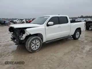 2023 Nissan Frontier SV with VIN 1N6ED1FK8PN605547, listed as a Copart auction lot 43208425 with 29,797 mi miles and Salvage title. Bid and sale history available at DreamBid. Image 1.