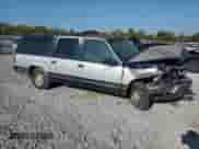 1994 Chevrolet Suburban with VIN 1GNEC16K1RJ410333, listed as a Copart auction lot 84595075 with 311,147 mi miles and Salvage title. Bid and sale history available at DreamBid. Image 4.