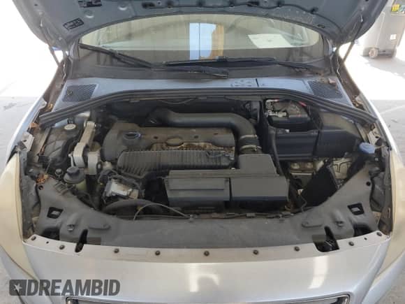 2013 Volvo S60 T5 Premier z VIN YV1612FS8D2206067, wystawiony jako Copart lot #71560615 z przebiegiem 96 211 mil mil oraz Szkoda całkowita • Salvage title. Historia ofert i sprzedaży dostępna na DreamBid. Obrazek 11.