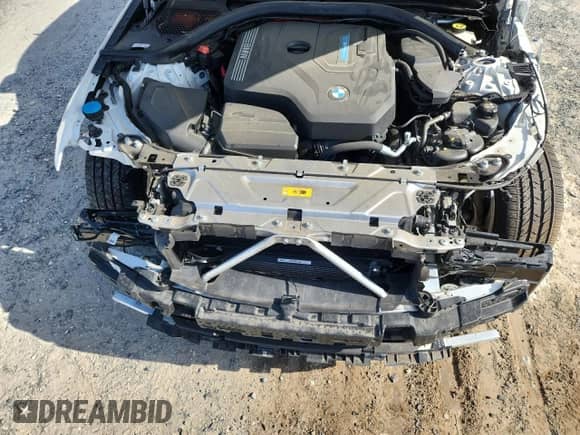 2023 BMW 3 Series 330e xDrive z VIN 3MW39FS06P8D08614, wystawiony jako Copart lot #65201655 z przebiegiem 22 451 mil mil oraz Szkoda całkowita • Salvage title. Historia ofert i sprzedaży dostępna na DreamBid. Obrazek 11.