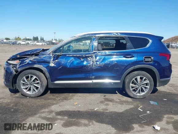 2019 Hyundai Santa Fe SEL Plus with VIN 5NMS33AD5KH104246, listed as a IAAI auction lot 43379674 with 128,473 mi miles and . Bid and sale history available at DreamBid. Image 14.