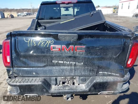 2021 GMC Sierra 1500 Denali with VIN 1GTU9FEL1MZ245338, listed as a IAAI auction lot 41578790 with 53,181 mi miles and . Bid and sale history available at DreamBid. Image 16.