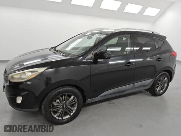 2015 Hyundai Tucson SE z VIN KM8JUCAG1FU038131, wystawiony jako Copart lot #84521605 z przebiegiem 147 573 mil mil oraz Czysty tytuł • Clean title. Historia ofert i sprzedaży dostępna na DreamBid. Obrazek 1.