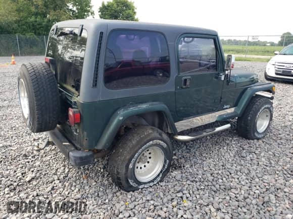 2001 Jeep Wrangler SE with VIN 1J4FA29P91P335568, listed as a Copart auction lot 68877805 with Not provided miles and Clean title. Bid and sale history available at DreamBid. Image 3.