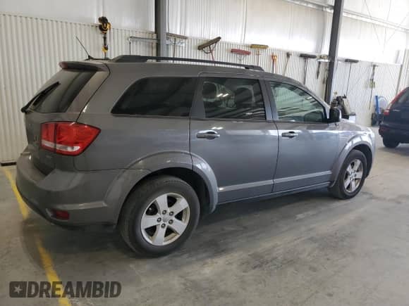 2012 Dodge Journey SXT with VIN 3C4PDCBG1CT265208, listed as a Copart auction lot 82449245 with 99,524 mi miles and Clean title. Bid and sale history available at DreamBid. Image 3.
