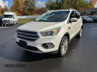 2017 Ford Escape Titanium с VIN 1FMCU9JD7HUE28039, выставлен на аукционе Copart как лот 89850105 с пробегом 107 762 миль миль и Чистый • Clean title. История ставок и продаж доступна на DreamBid. Изображение 1.